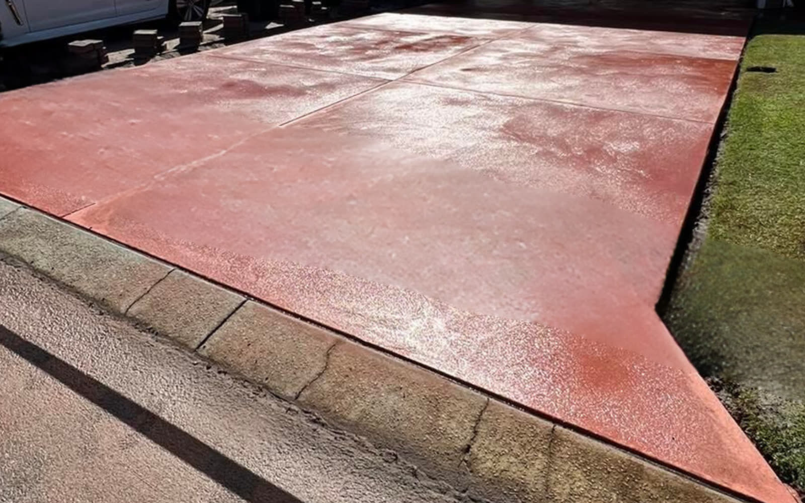 Red oxide coloured concrete driveway